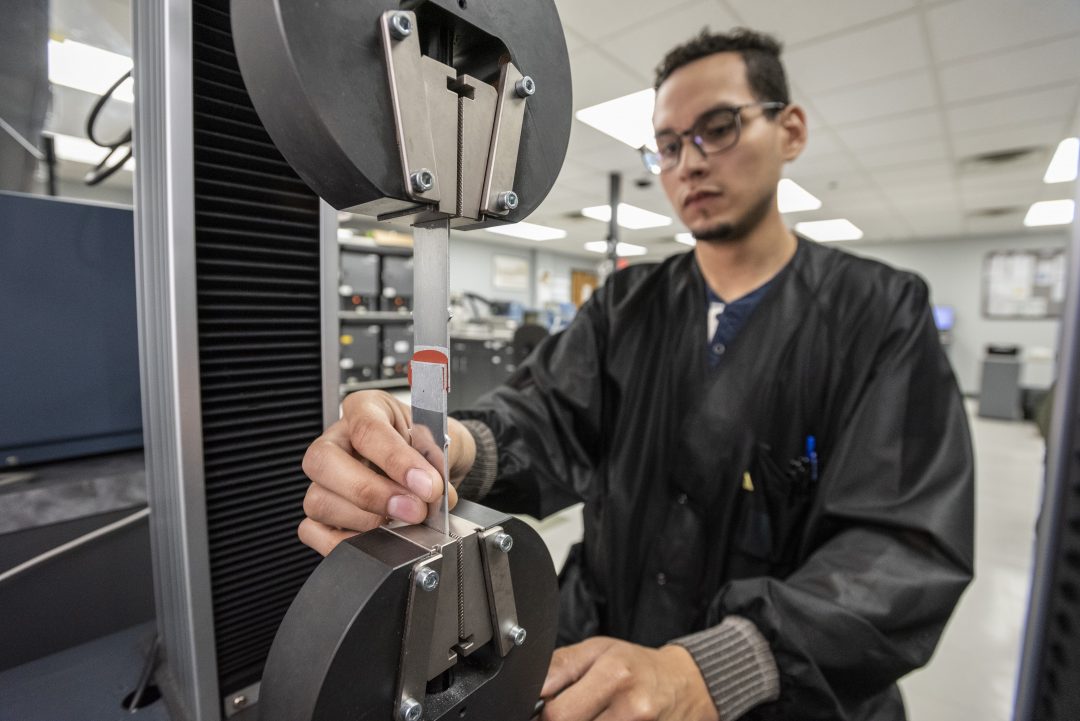 Testing lap shear in the Appli-Tec QC lab.